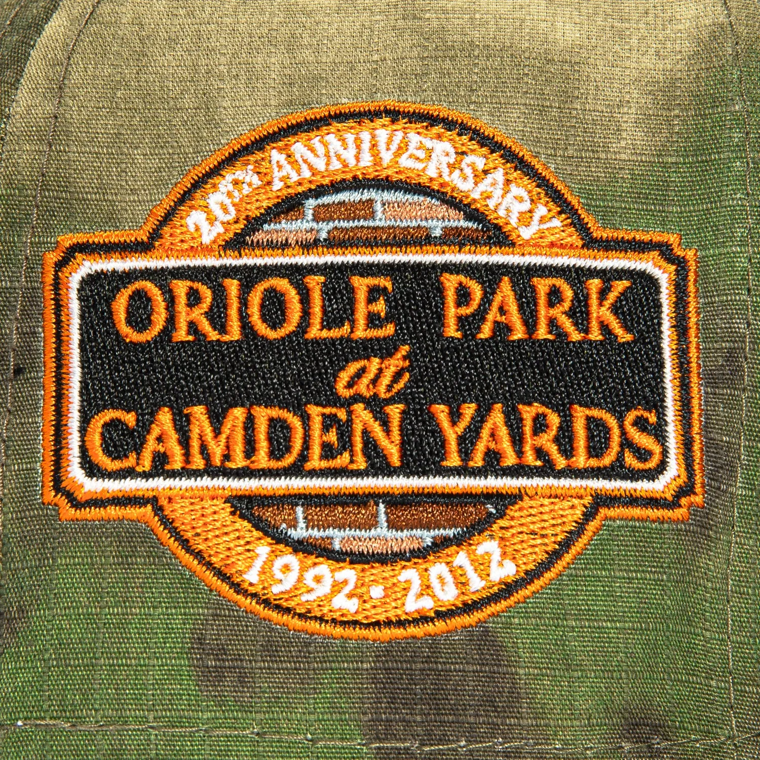 New Era 59Fifty Water Color Camo Baltimore Orioles 20th Anniversary Stadium Patch Hat - Camo. Green